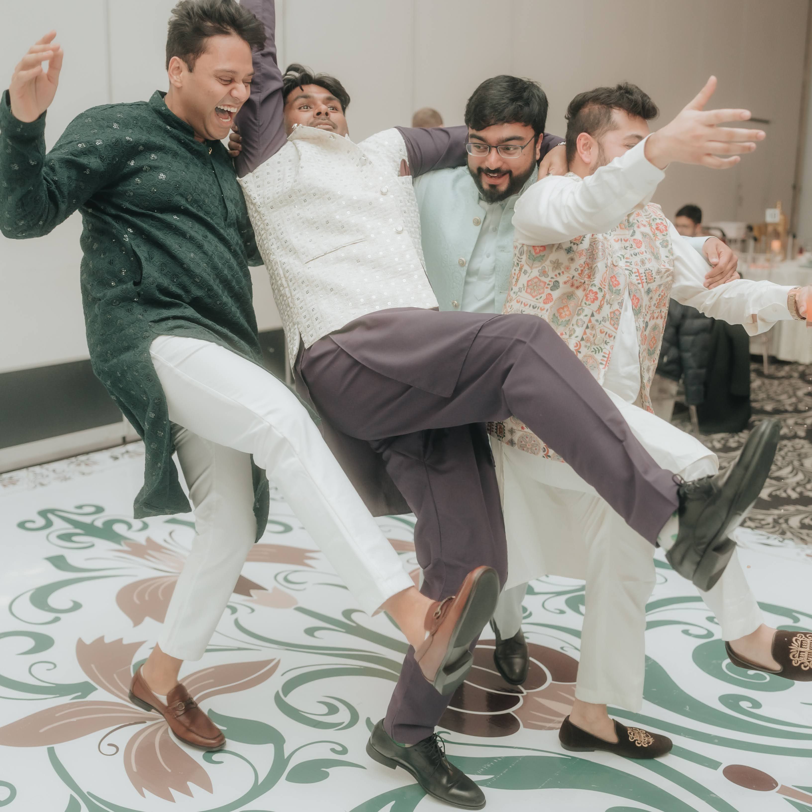 group of friends dancing and having fun